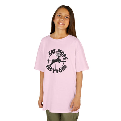 Young girl wearing a pink t-shirt with a colorful heart design on a white background