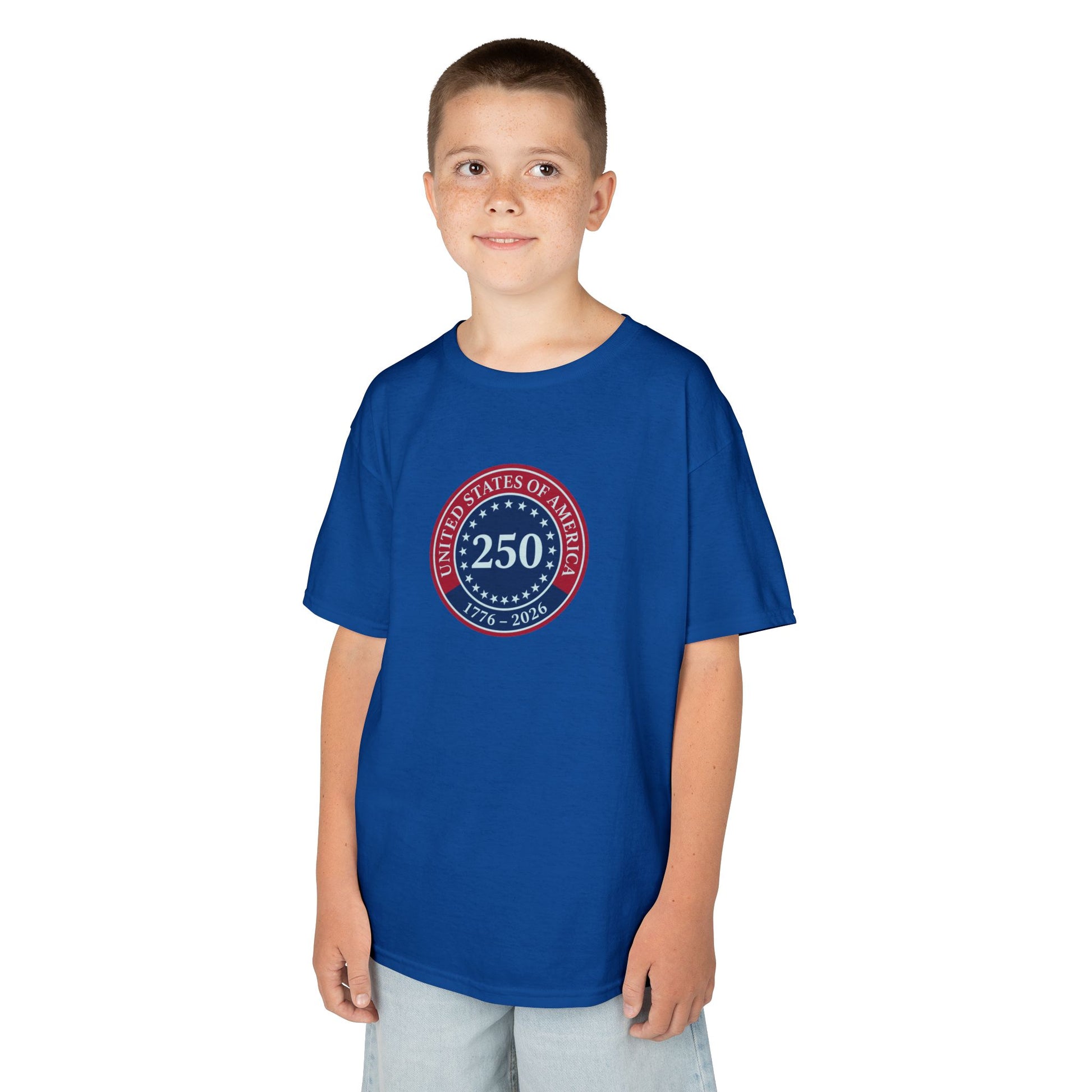 Child wearing a blue t-shirt with a graphic design on a white background