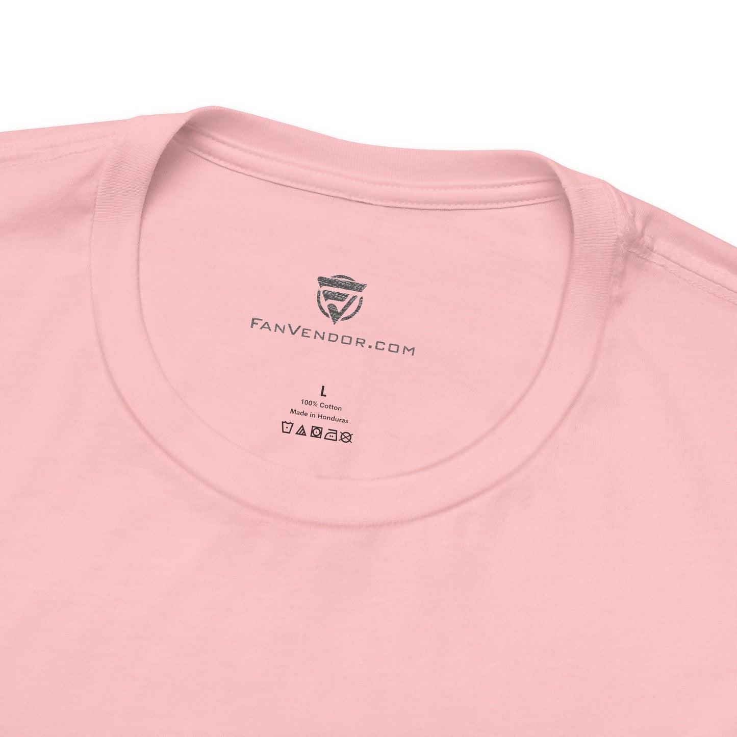 Close-up of a pink t-shirt with 'FanVendor.com' logo and text on the collar.