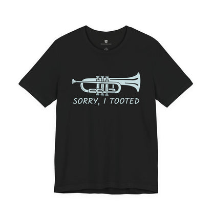 Black t-shirt with a white trumpet graphic and text on a white background