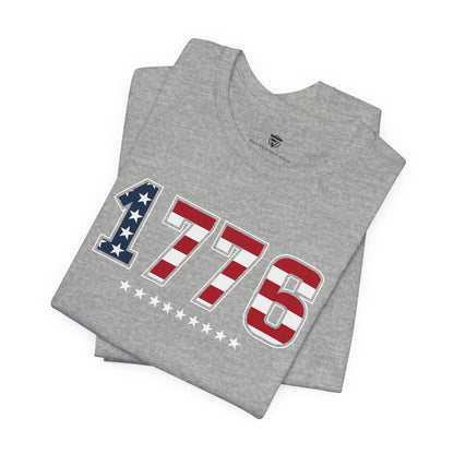 Gray t-shirt with '1776' design featuring American flag colors on a white background