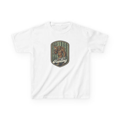 White t-shirt with a graphic of bigfoot in a forest and text on a white background