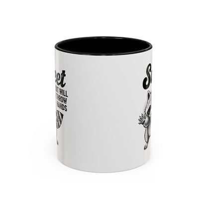 White mug with black interior and handle, featuring black text and graphics on a white background