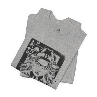 Gray t-shirt with graphic design of a person wearing a hat and glasses on a white background