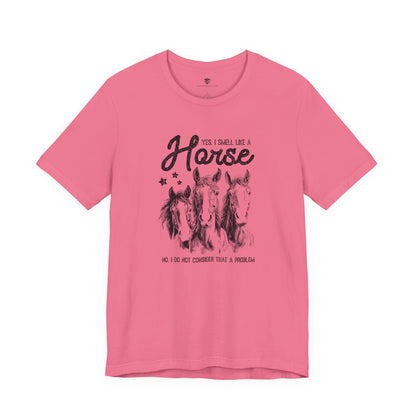 Pink t-shirt with horse graphic and text 