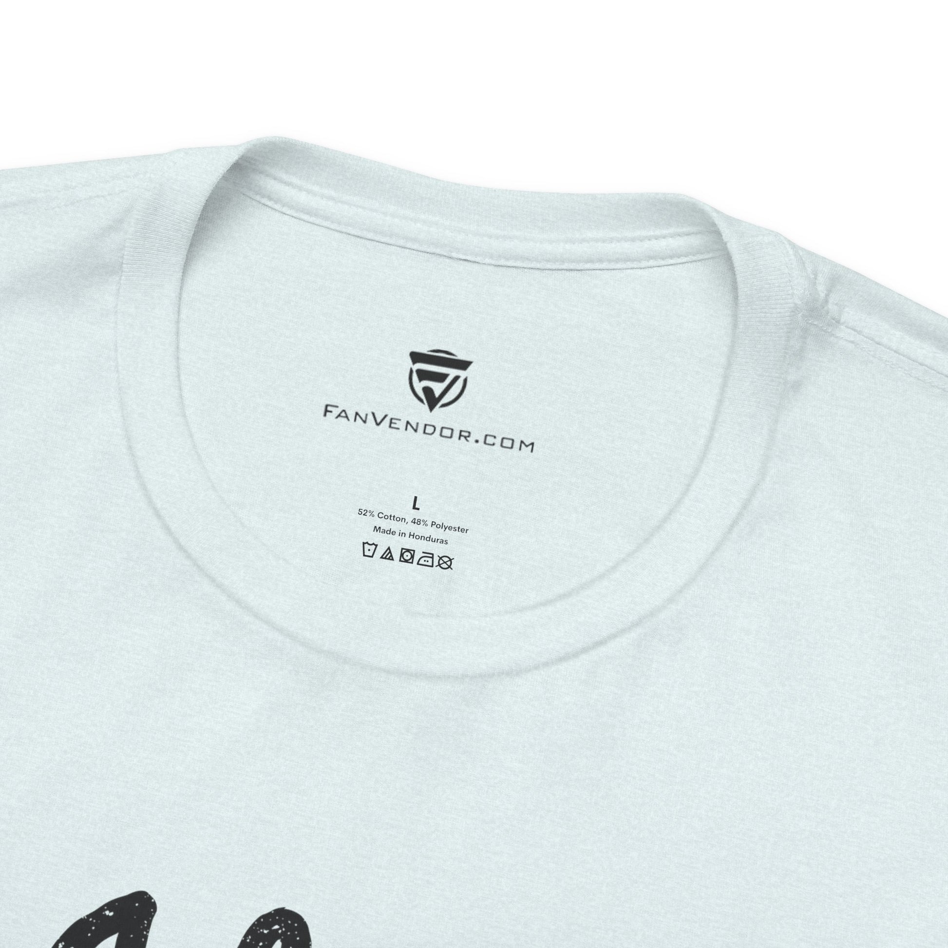 Close-up of a white t-shirt with 'Fanvendor.com' branding on the collar.