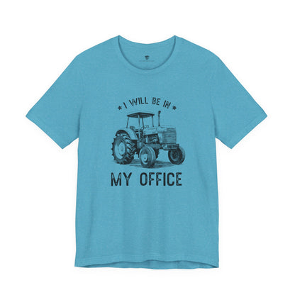 Blue t-shirt with tractor graphic and text 