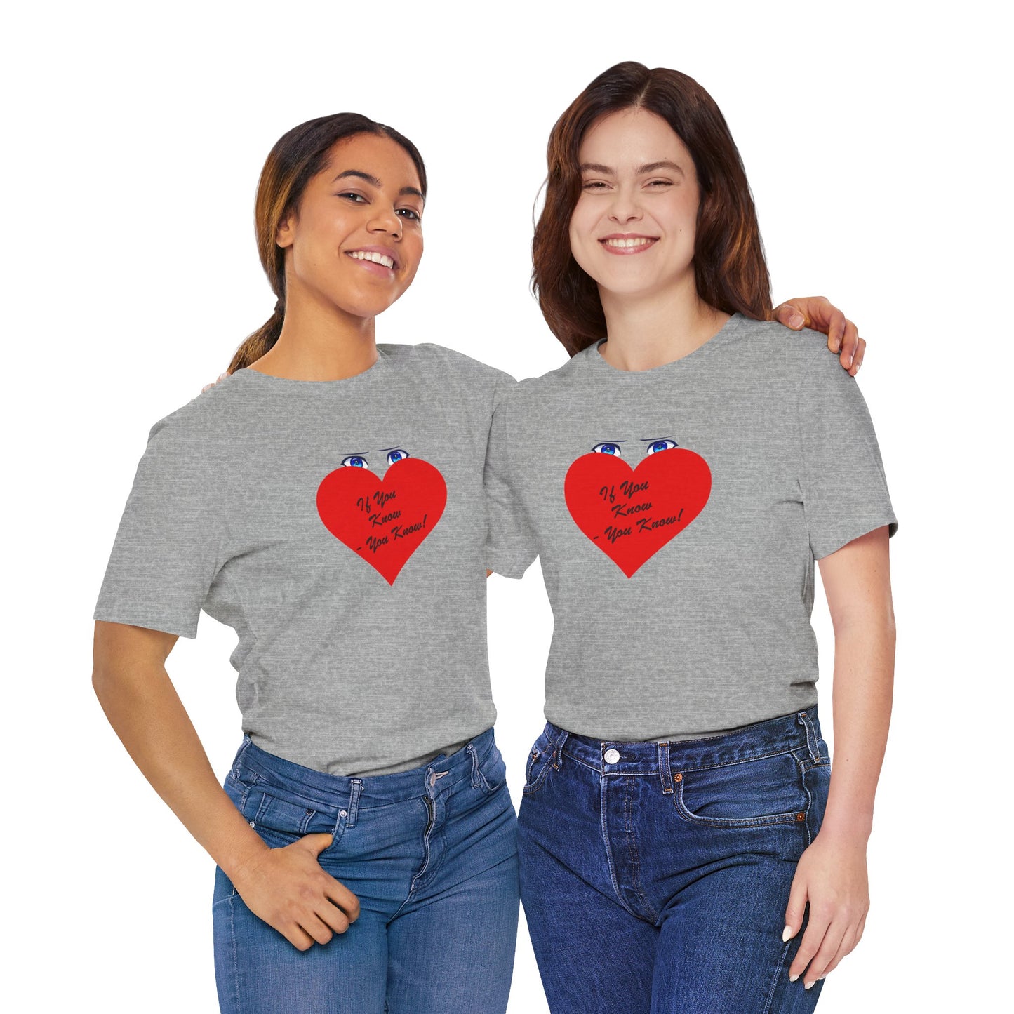 Two women wearing gray t-shirts with red heart designs and blue text.