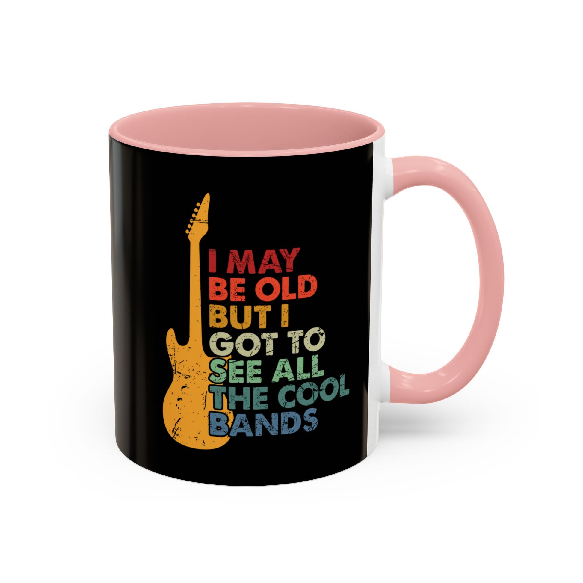Black mug with pink interior and handle featuring a guitar graphic and text.