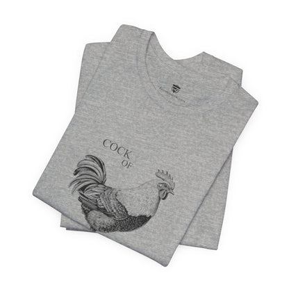 Folded gray t-shirt with a rooster design and text 