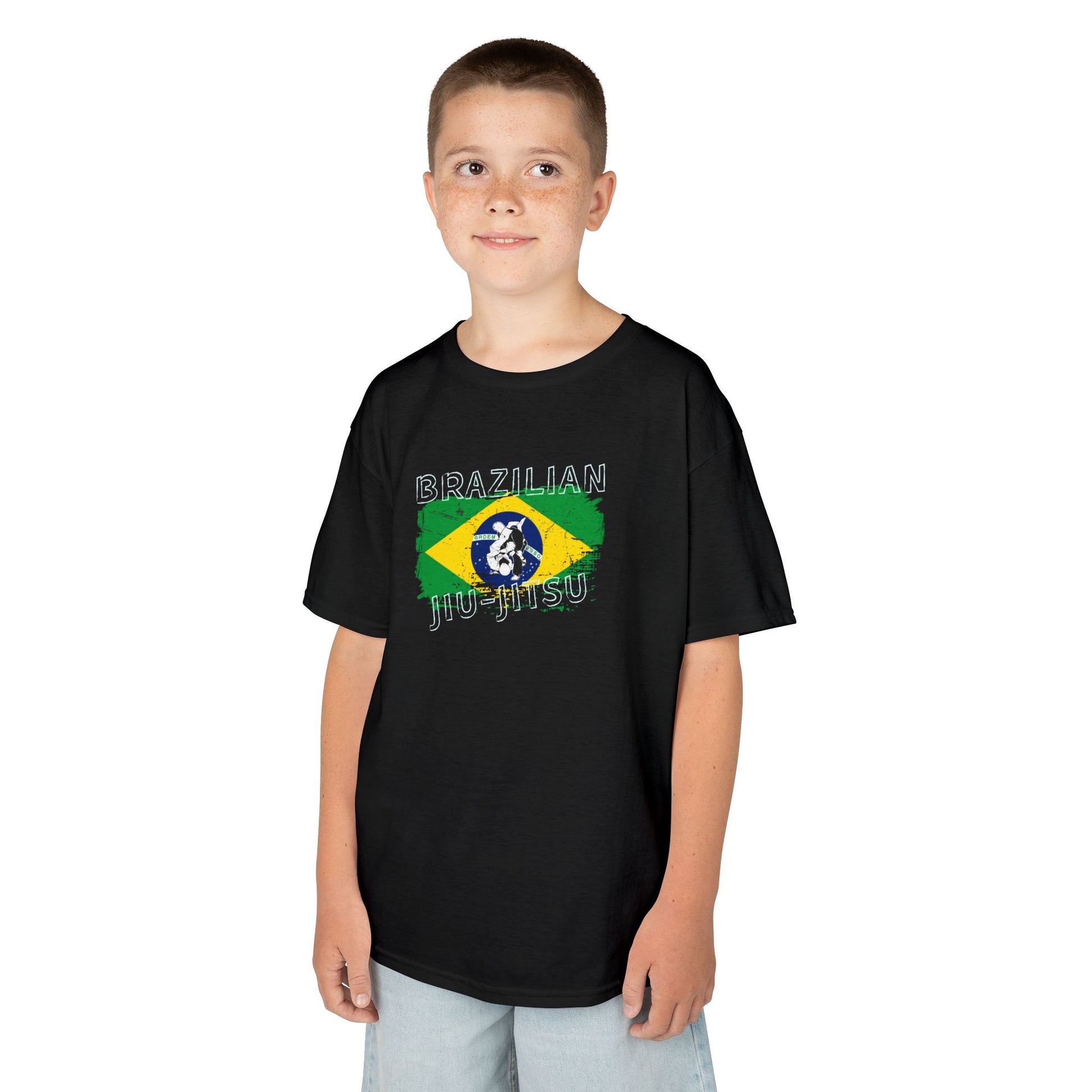 Child wearing a black 'Brazilian Jiu-Jitsu' t-shirt with a flag design on a white background