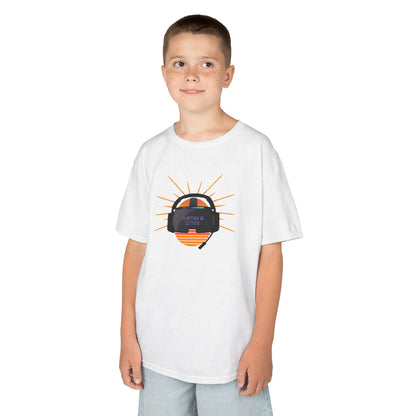 Child wearing a white t-shirt with a graphic design on a white background