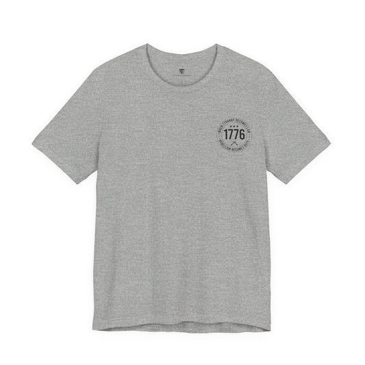 Gray t-shirt with a logo on the chest against a white background