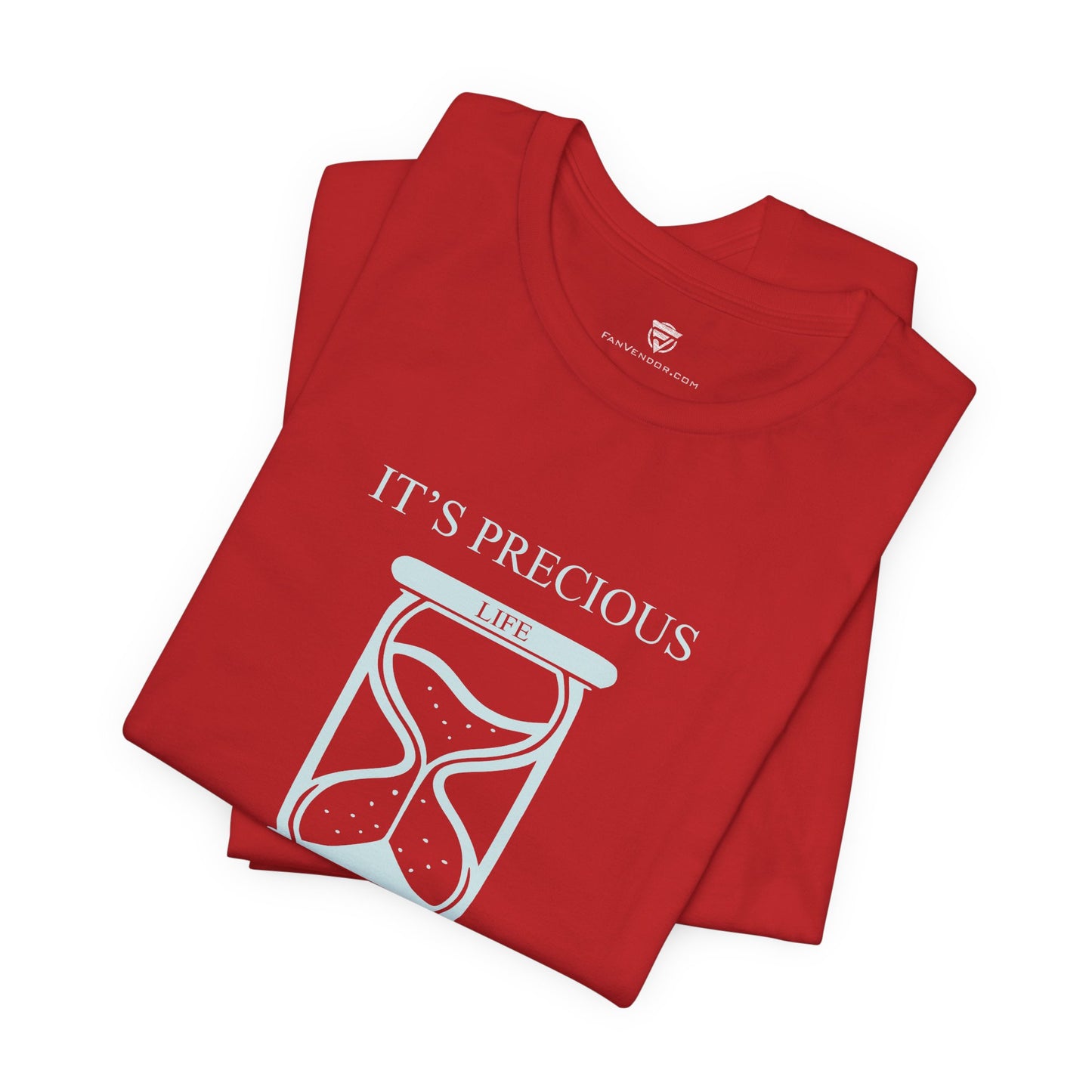 Folded red t-shirt with 'It's Precious Life' design on a white background