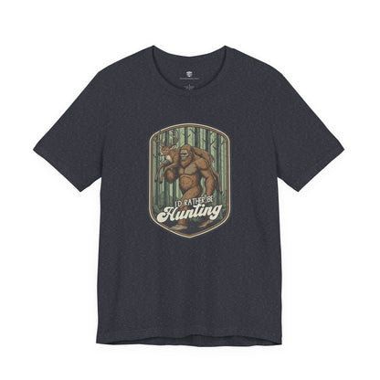 t-shirt with a graphic of a Big Foot and text 'I'd Rather Be Hunting' 