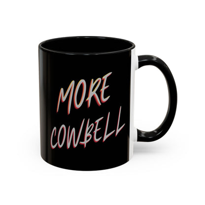 Black mug with 'More Cowbell' text on a white background
