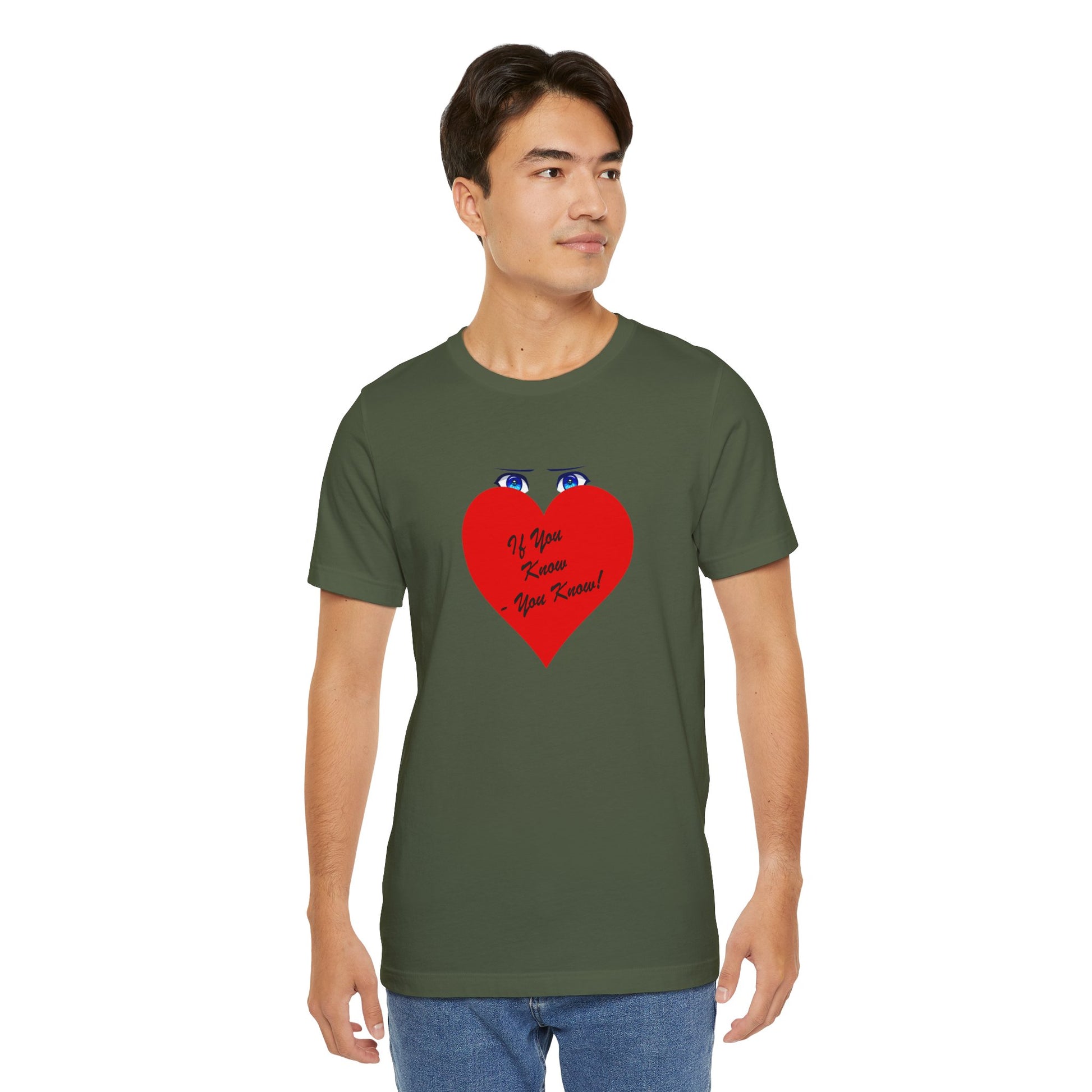 Man wearing a green t-shirt with a red heart design on a white background