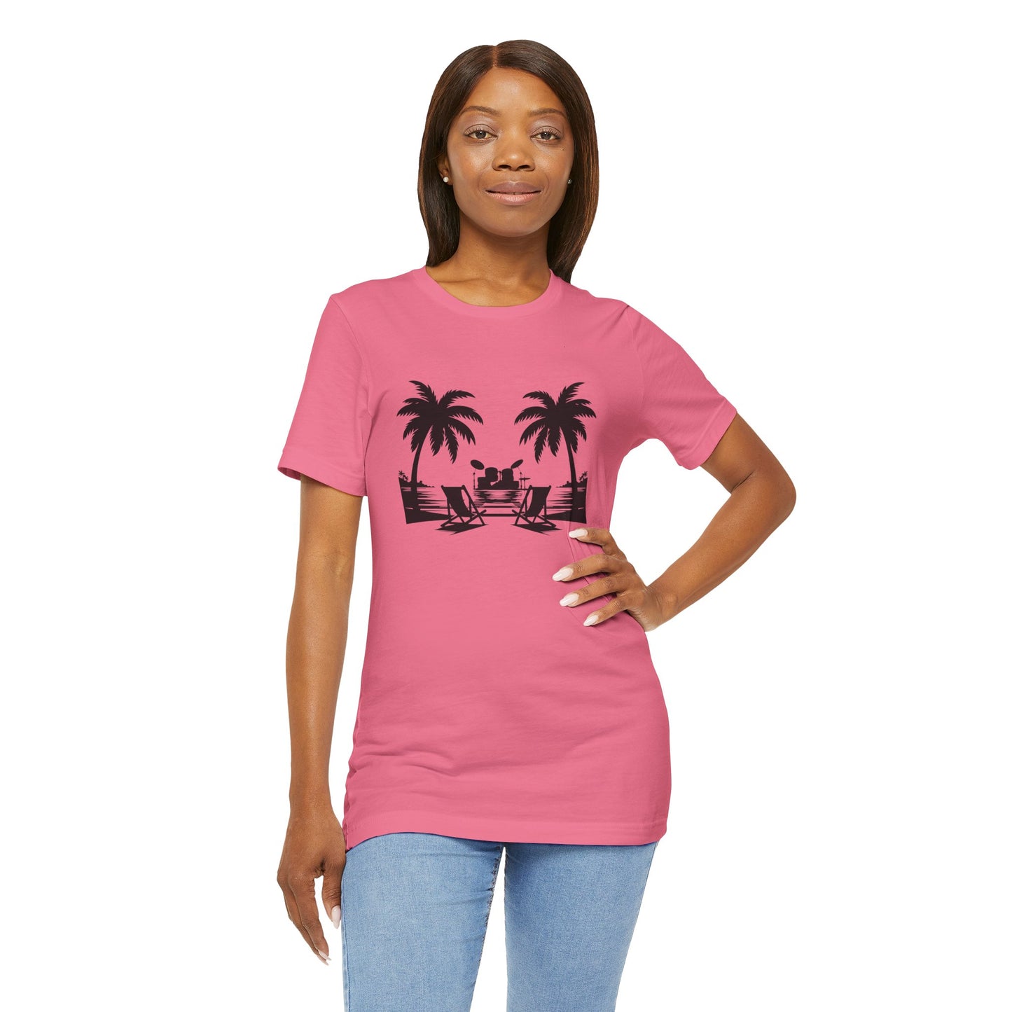 Woman wearing a pink t-shirt with a black graphic design on a white background