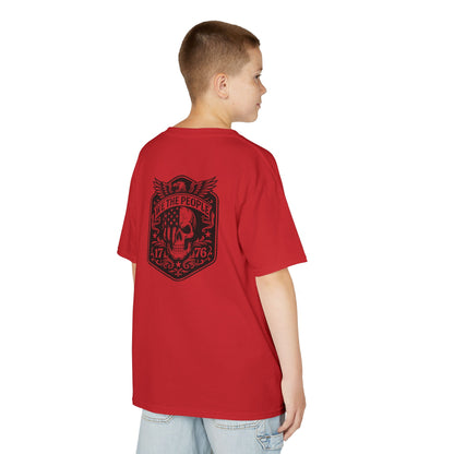 Child wearing a red t-shirt with a black graphic design on the back, standing against a white background