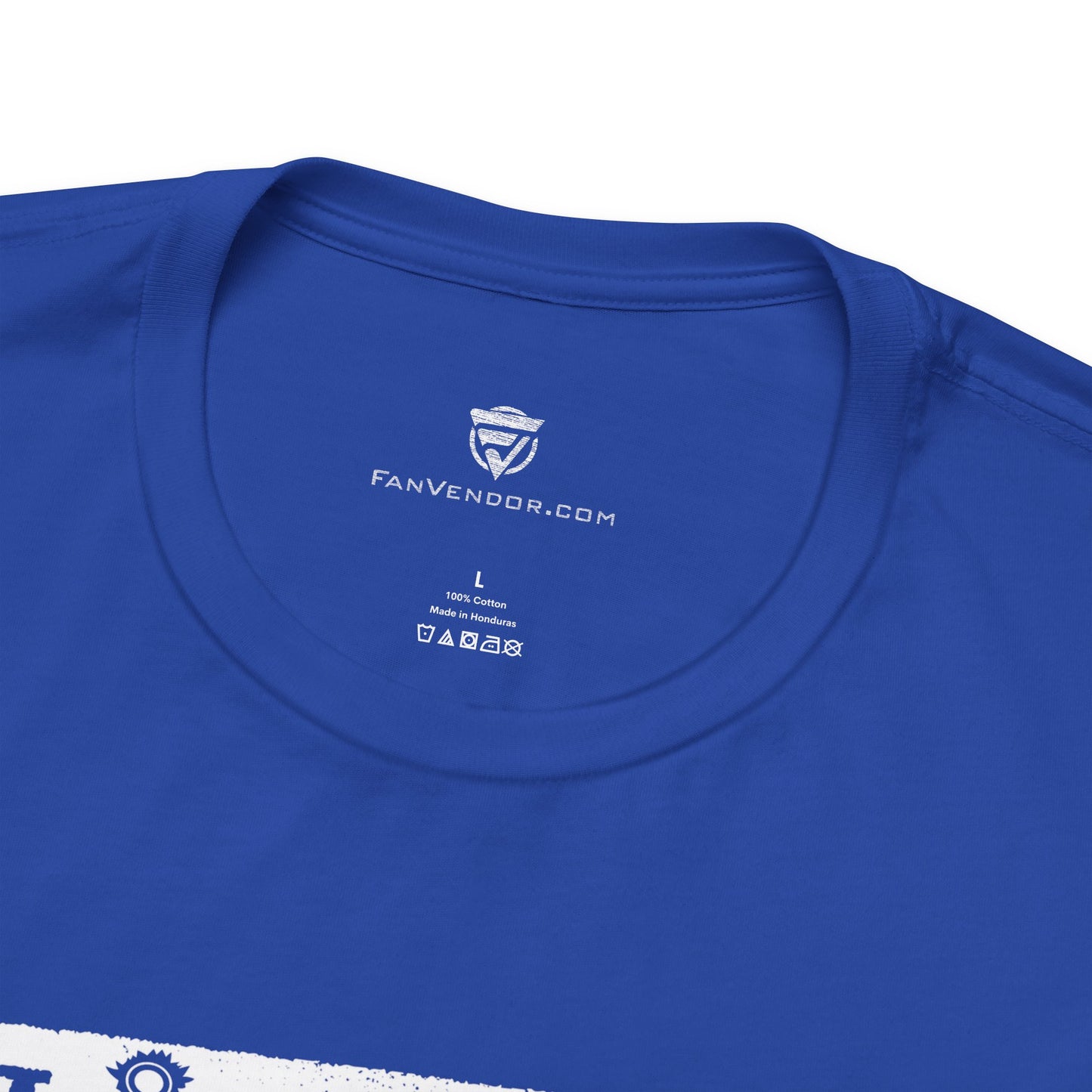 Close-up of a blue t-shirt with 'FanVendor.com' branding on the collar.