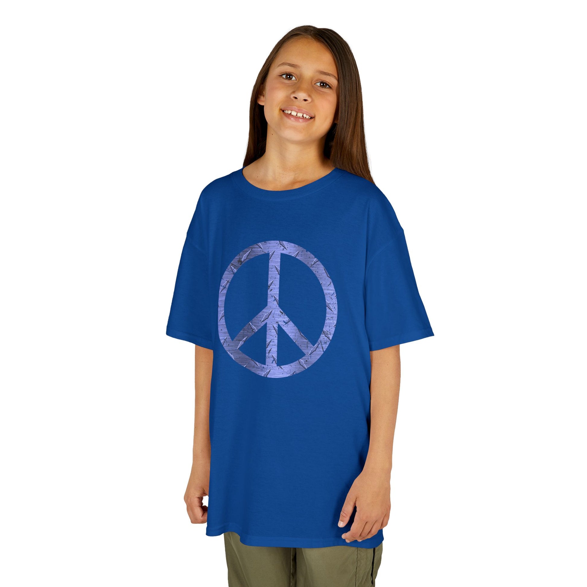 Child wearing a blue t-shirt with a peace symbol design on a white background
