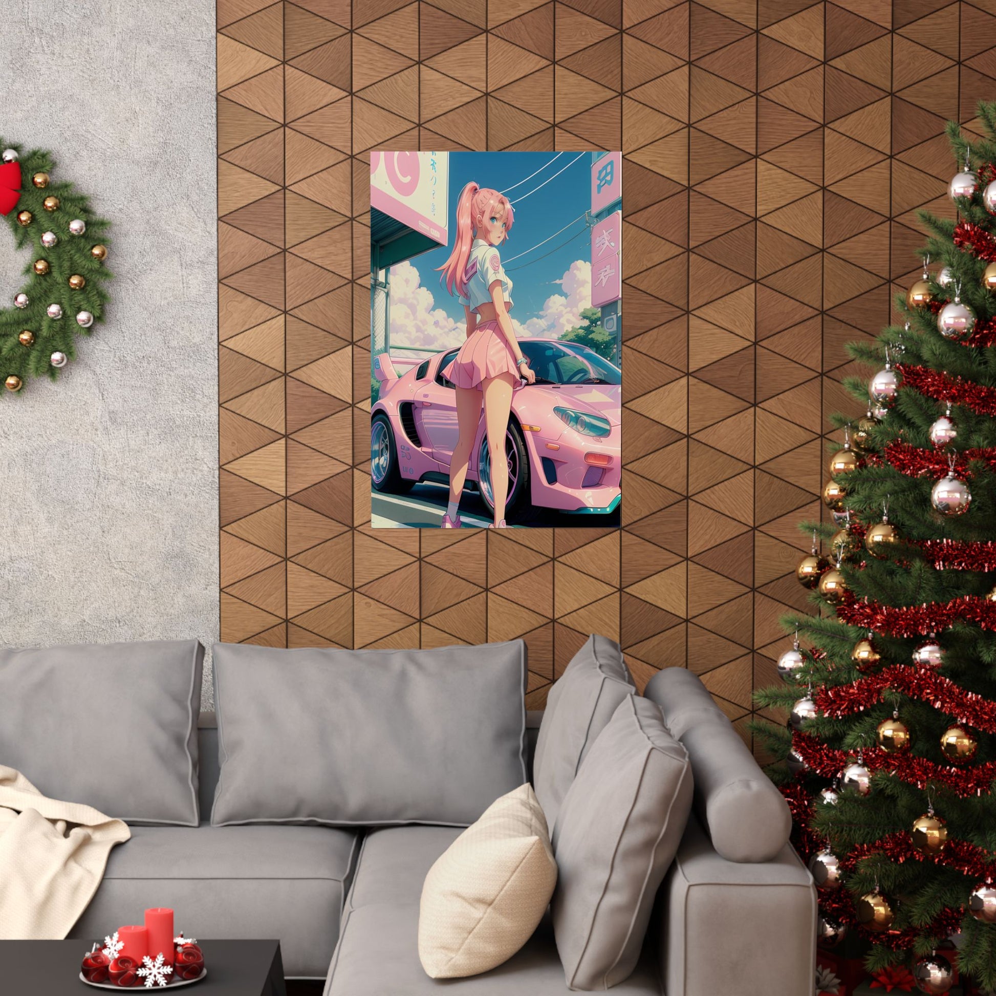 Living room with a gray sofa, Christmas tree, and anime poster on a geometric-patterned wall.