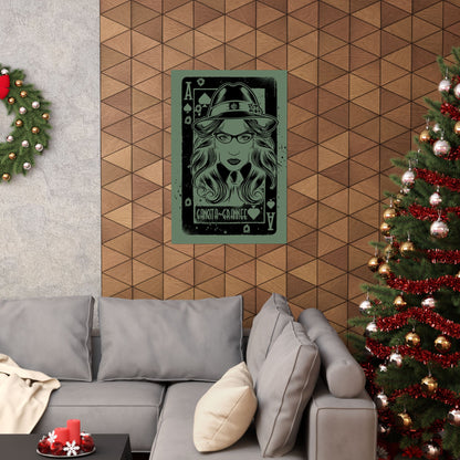Living room with a gray sofa, Christmas tree, and wall art.