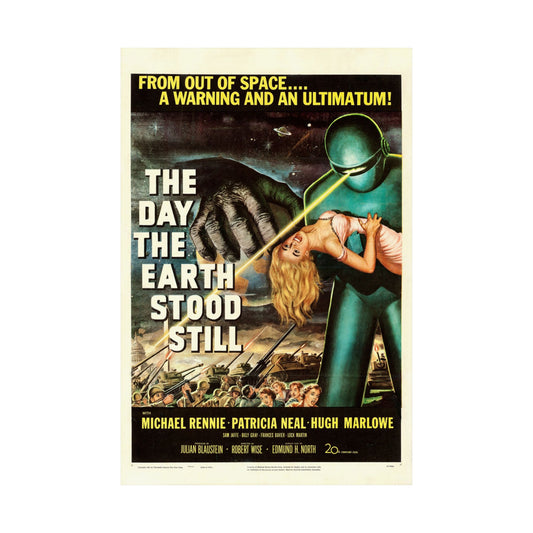 Vintage movie poster for 'The Day the Earth Stood Still' with a green alien holding a woman.