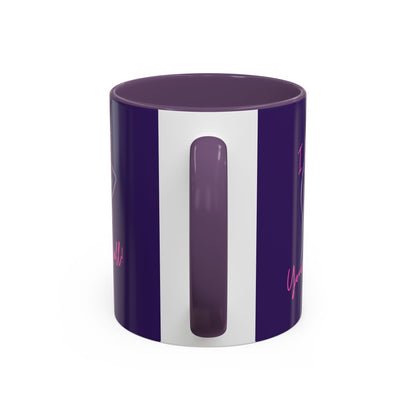 Purple and white cylindrical mug with a handle on a white background