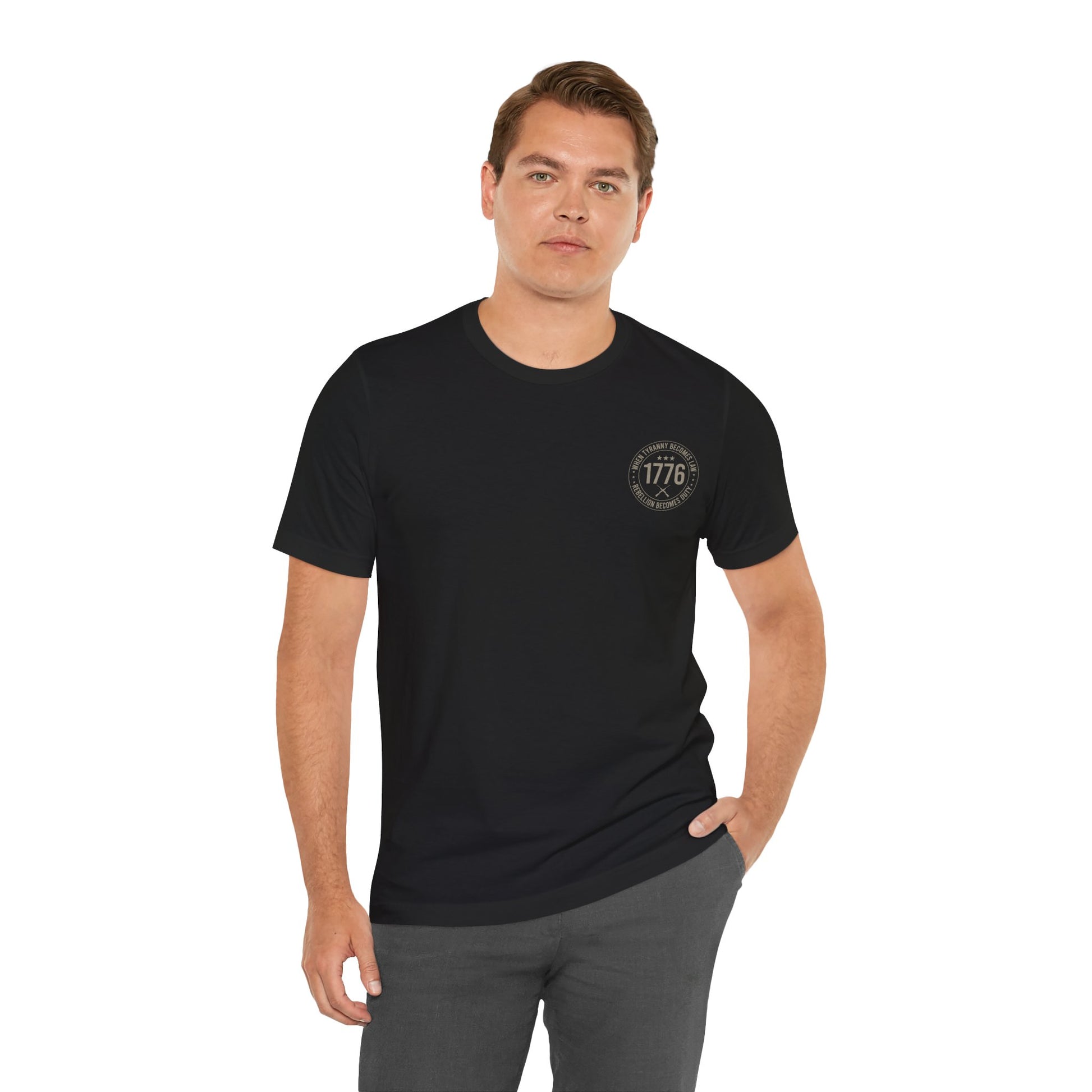Man wearing a black t-shirt with a logo on a white background