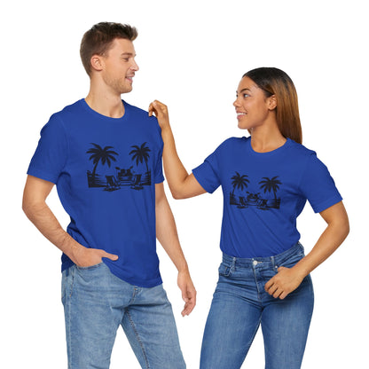 Two people wearing matching blue t-shirts with a graphic design on a white background