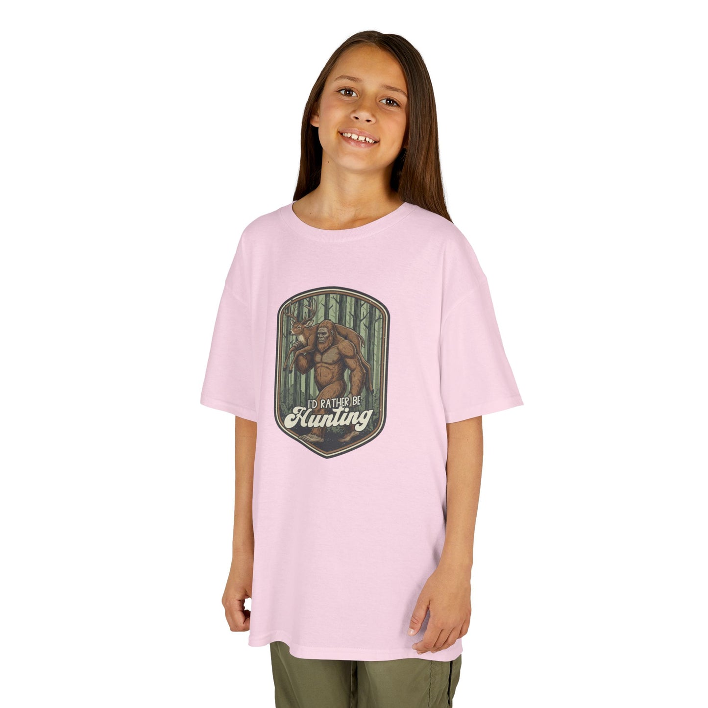 Young girl wearing a pink t-shirt with a graphic design on a white background