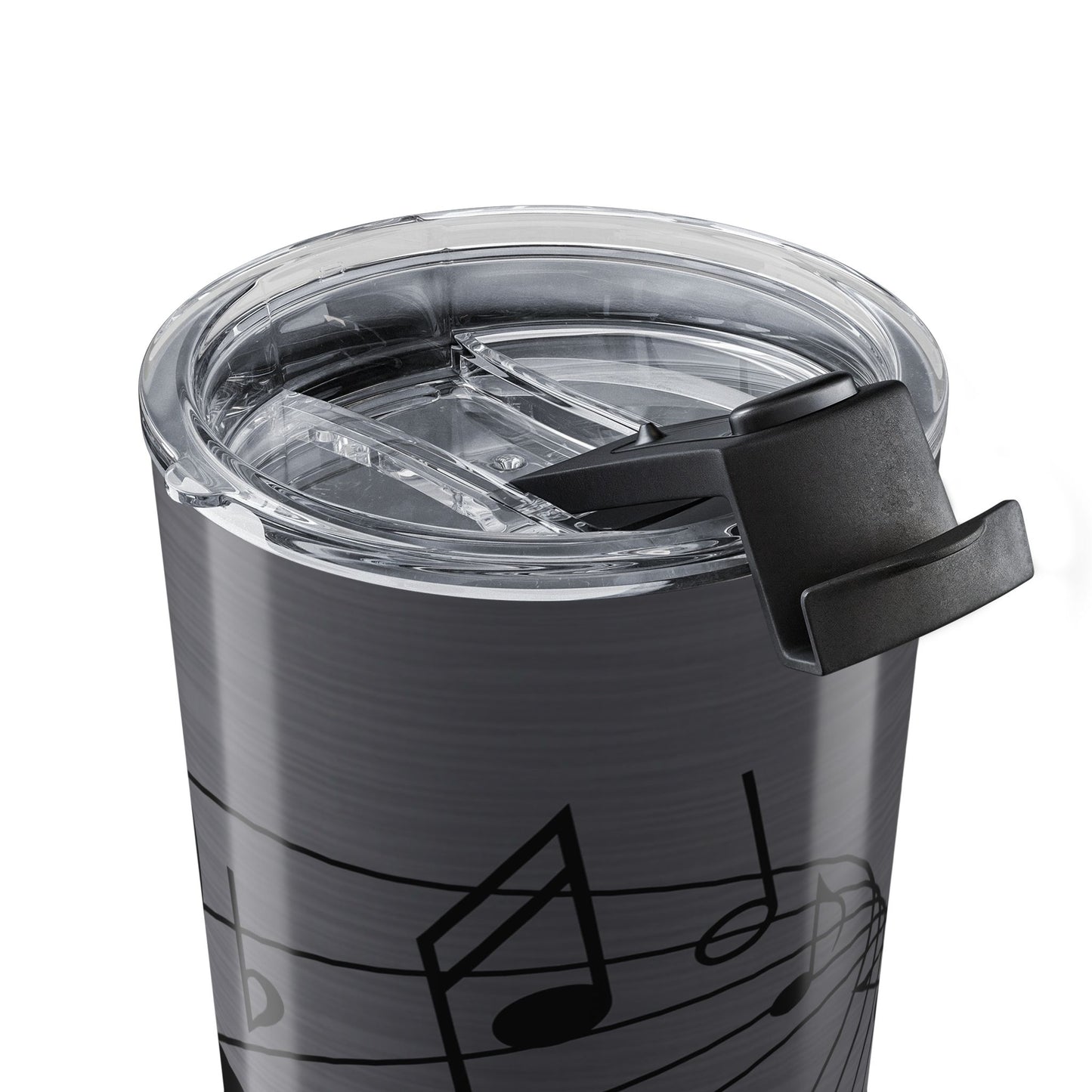 Clear tumbler with black music note design on a white background
