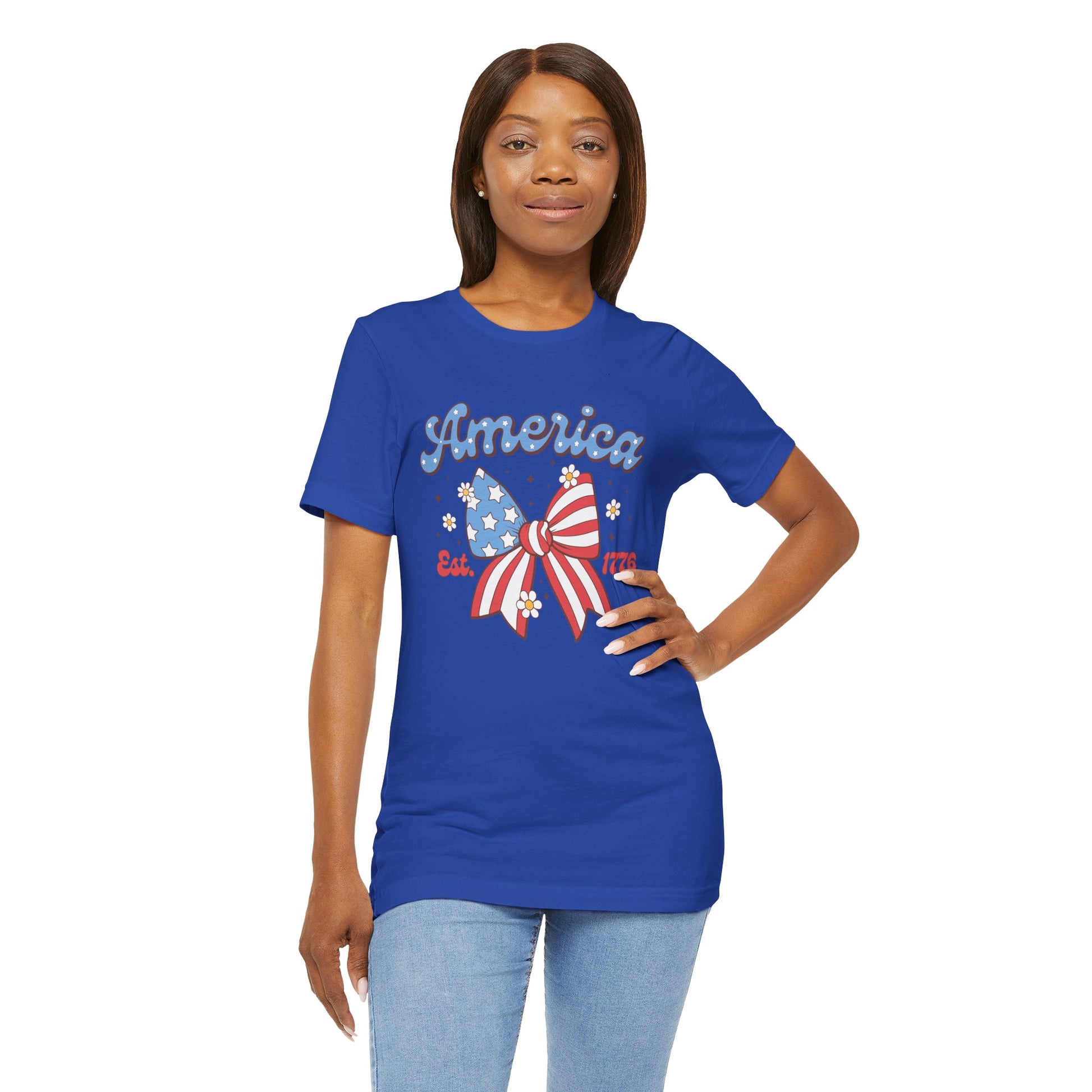Woman wearing a blue t-shirt with 'America' and an American flag design on a white background