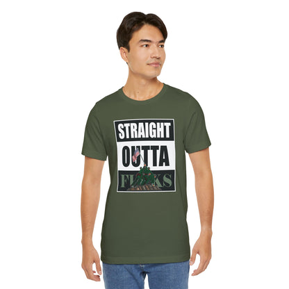 Man wearing a green t-shirt with text and graphic design on a white background