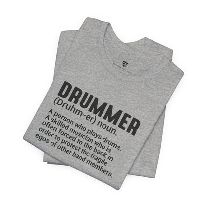 Gray t-shirt with black text defining 'drummer' on a white background