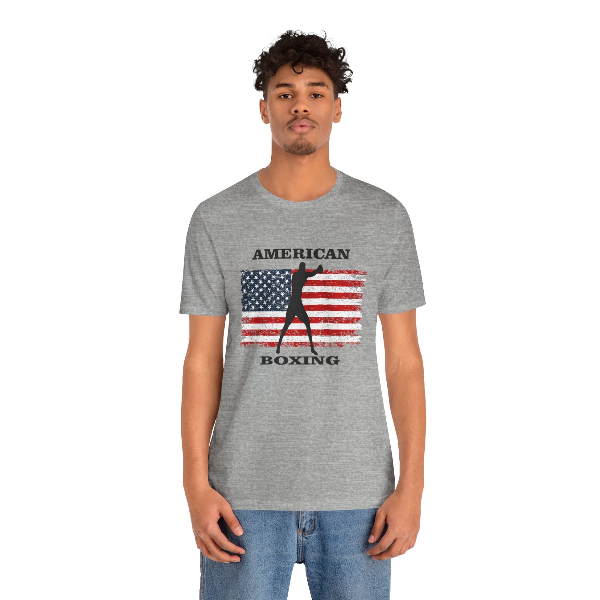 Person wearing a gray t-shirt with 'American Boxing' design on a white background