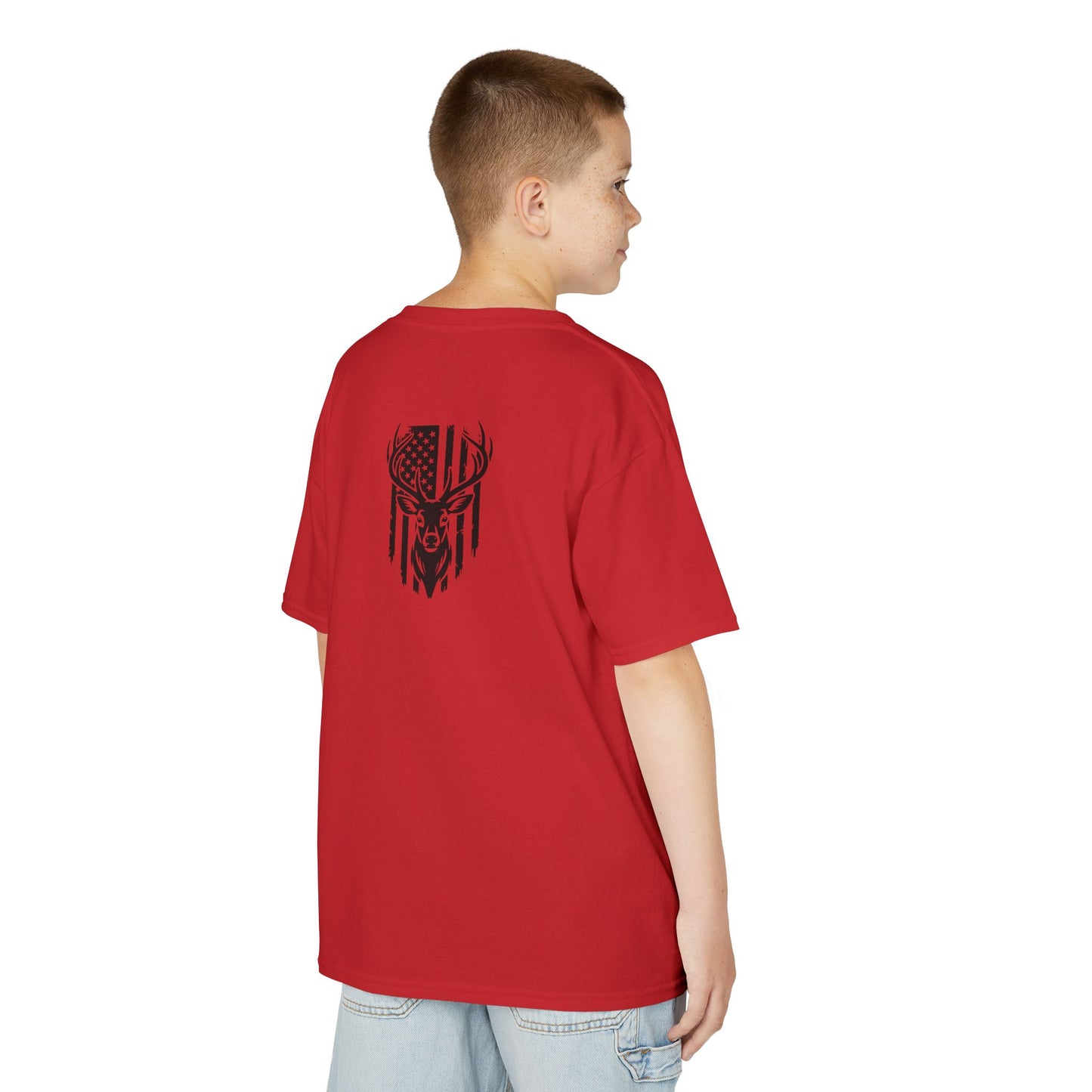Person wearing a red t-shirt with a black graphic on the back, standing against a white background