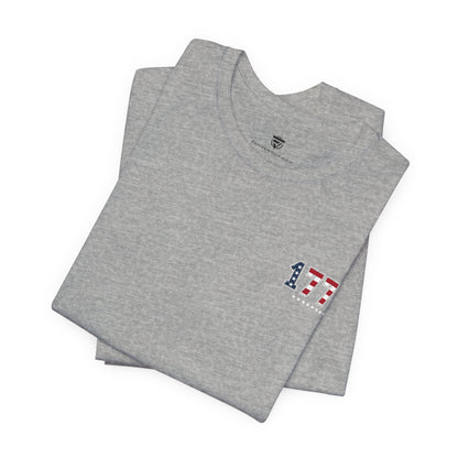 Folded grey t-shirt with 1776 design and Fan Vendor logo in background