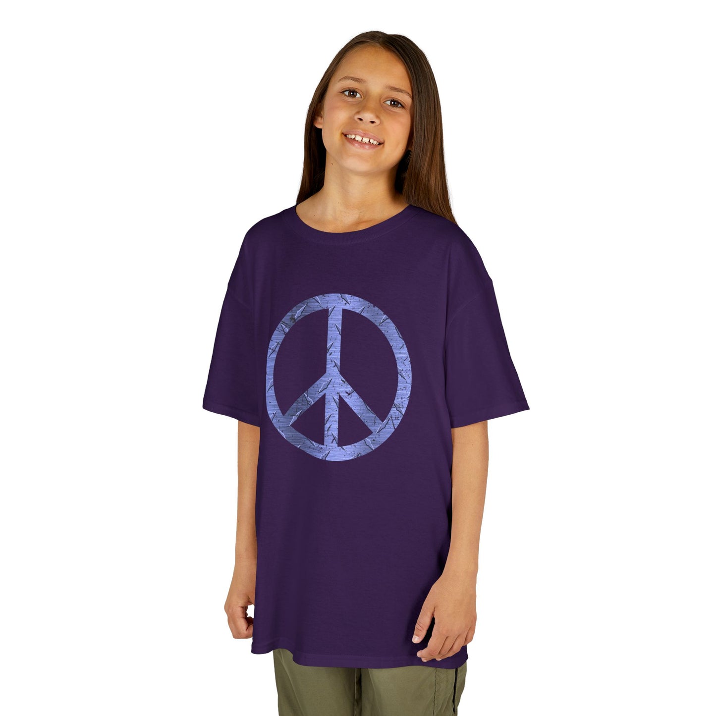 Child wearing a purple t-shirt with a peace symbol design on a white background