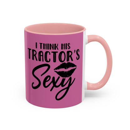 Pink mug with black text and lip graphic on a white background