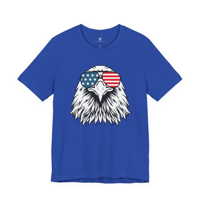 Blue t-shirt with an eagle wearing American flag sunglasses design on a white background