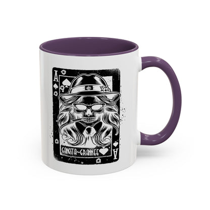 Mug with skull design and purple interior and handle on a white background