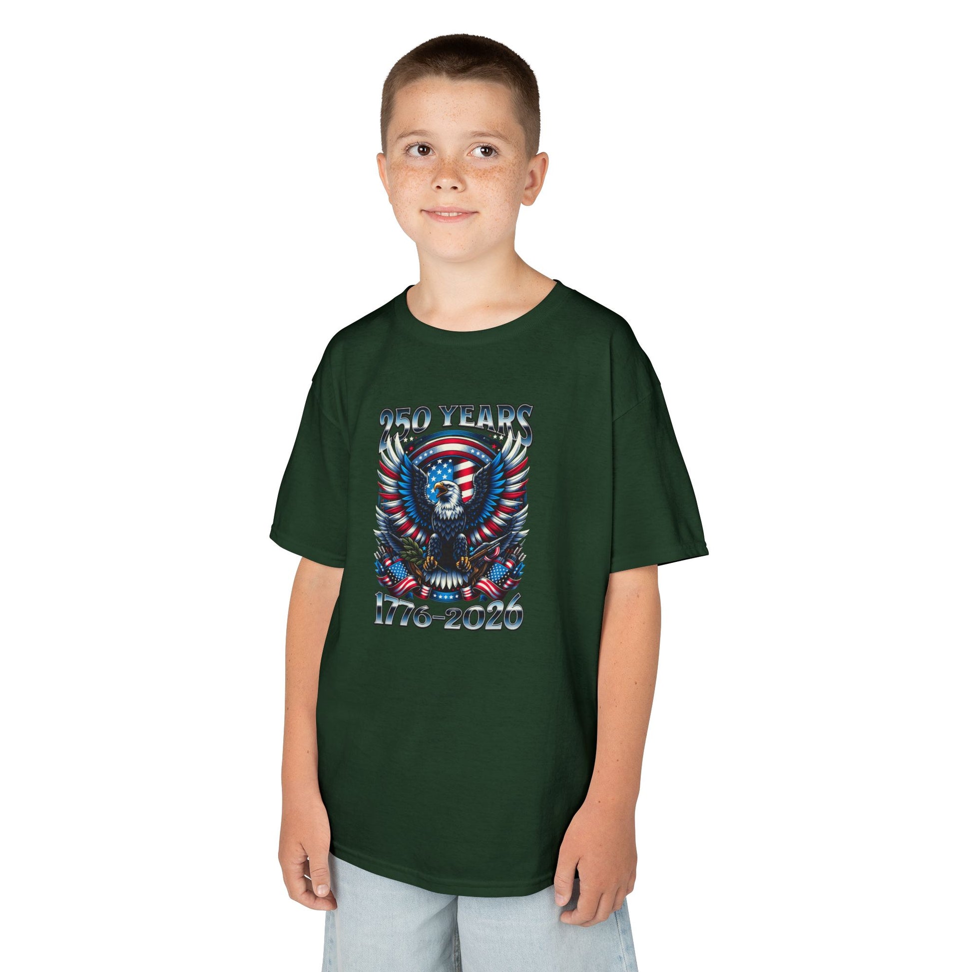 Child wearing a green t-shirt with a graphic design on a white background
