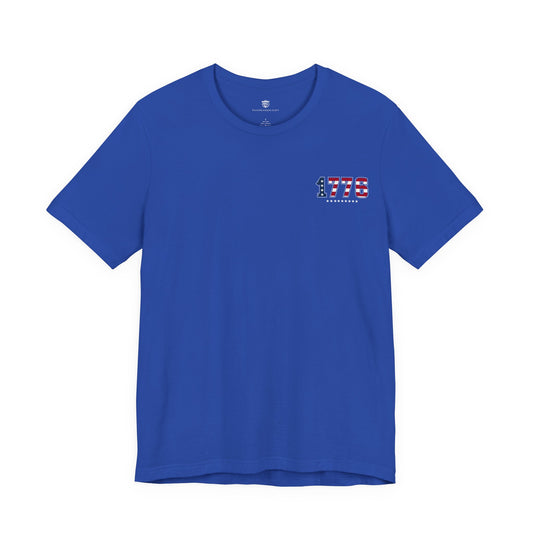 Blue t-shirt with a small logo on the chest against a white background