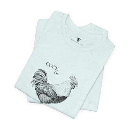 Folded t-shirt with a rooster design and text on a white background