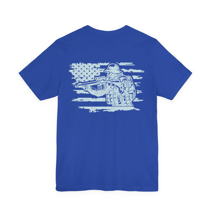 Blue t-shirt with white graphic of a soldier and American flag on a white background