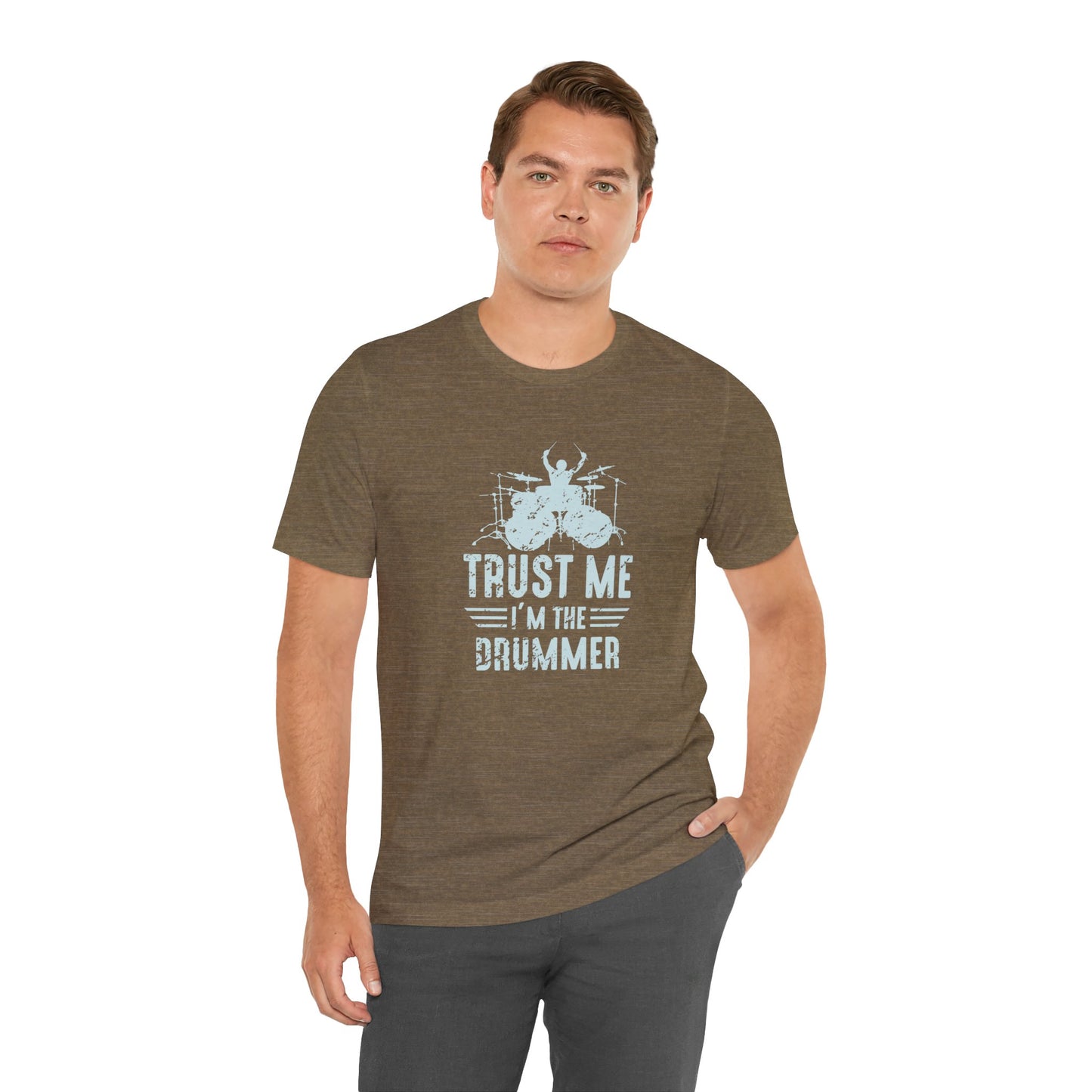 Man wearing a green t-shirt with 'Trust Me I'm the Drummer' text and graphic on a white background