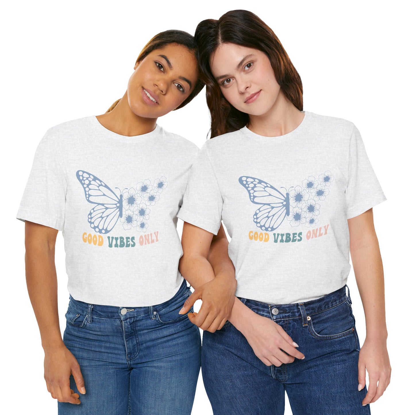 Two women wearing matching t-shirts with text and graphics on a white background.