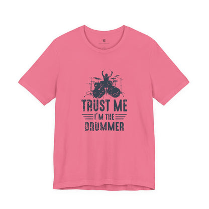 Pink t-shirt with graphic and text 'Trust Me I'm the Drummer'